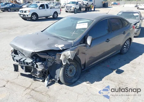 2014 Ford Focus S z USA, uszkodzony, nr VIN 1FADP3E22EL407791